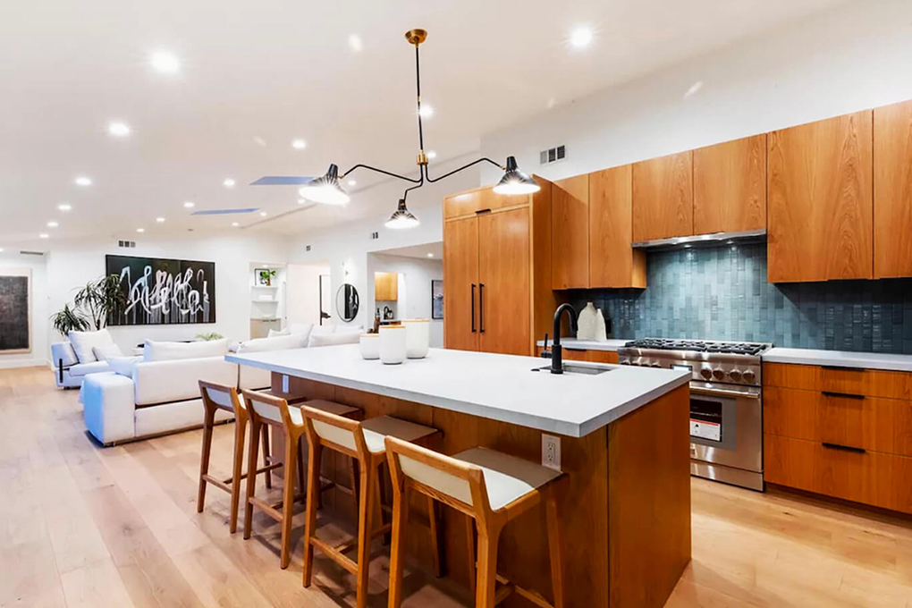 Modern kitchen with green tile backsplash