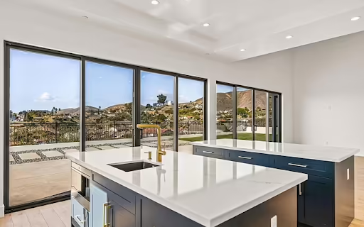 New white kitchen with open plan and windows